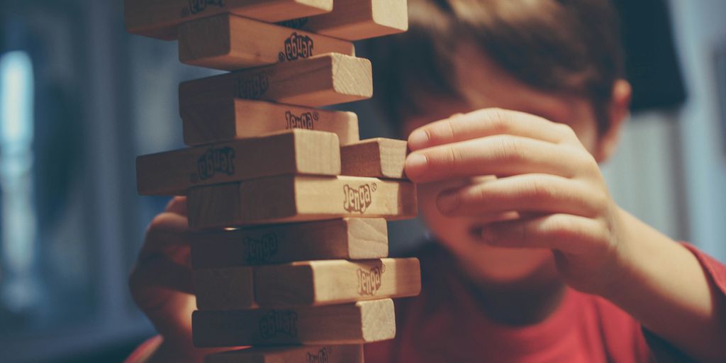 child playing jenga